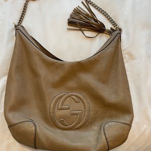 Gucci Pebbled Cross body Bag